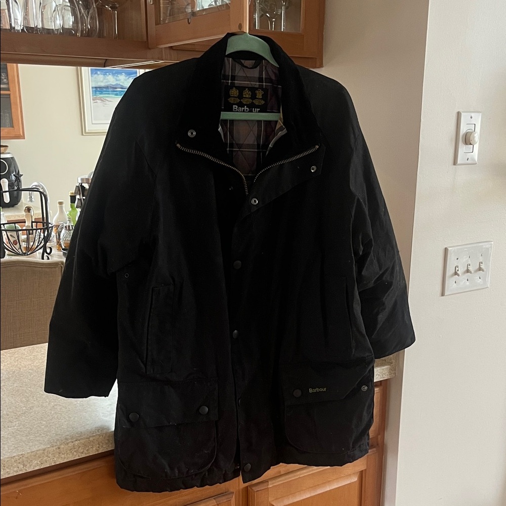 Barbour Men's black "Kelsey" wax jacket.
